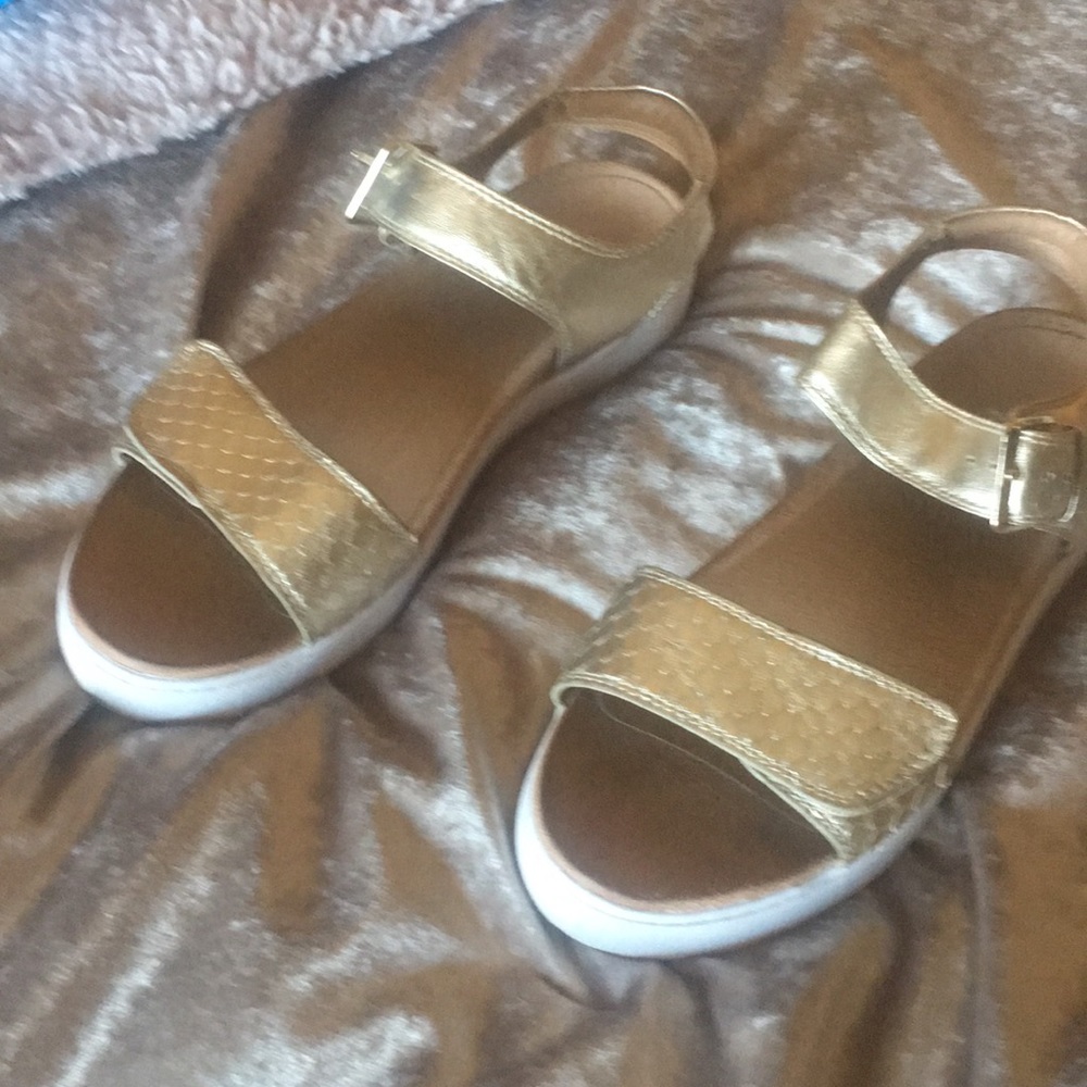Gold sandals.